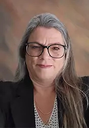 A headshot of Susan Booth