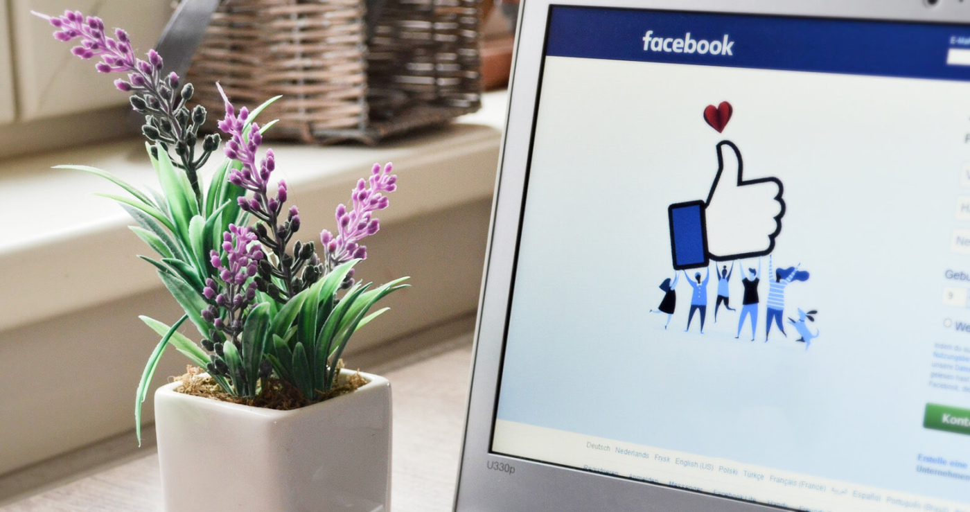 A desktop computer with a Facebook login page